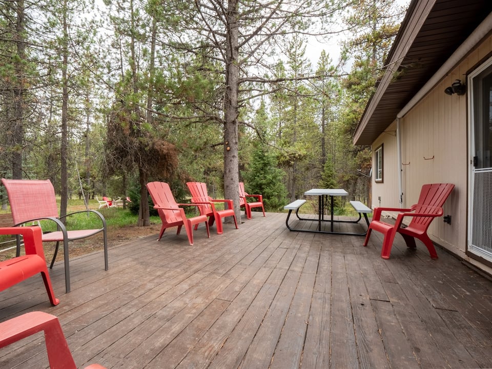 Wilderness Escape deck seating in an Island Park forest